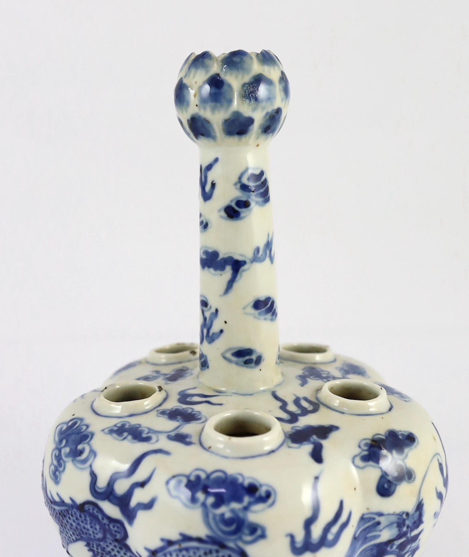 A Chinese blue and white ’dragon’ tulip vase, 19th century, 25cm high, splinter chips